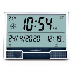Al-Harameen Mosque Azan Clock HA-4001 with digital LCD display showing prayer times, date, temperature, and Qibla direction. Features complete Azan for all prayers with adjustable volume control.