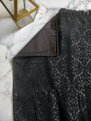 Elegant Aswad Black Luxury Prayer Mat made of high-quality Jacquard cotton, featuring intricate designs, measuring approximately 49x29 inches. This handcrafted prayer mat, made in Turkey, offers comfort and durability, making it a perfect gift for any occasion.